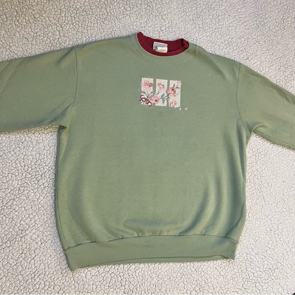Large green Top Stitch by Morning Sun sweater with pink flowers embroidered
